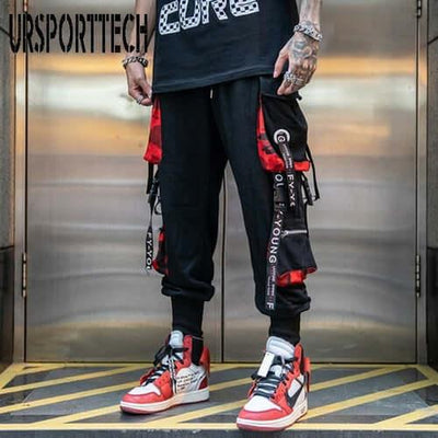 Letter Ribbons Cargo Pants displayed on a model, featuring a hip hop style with casual cargo design.