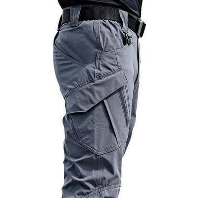Men's tactical cargo pants featuring multiple pockets in a stylish gray design.